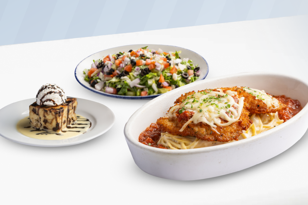 A chopped salad, Chicken Parmesan, and Tiramisu.