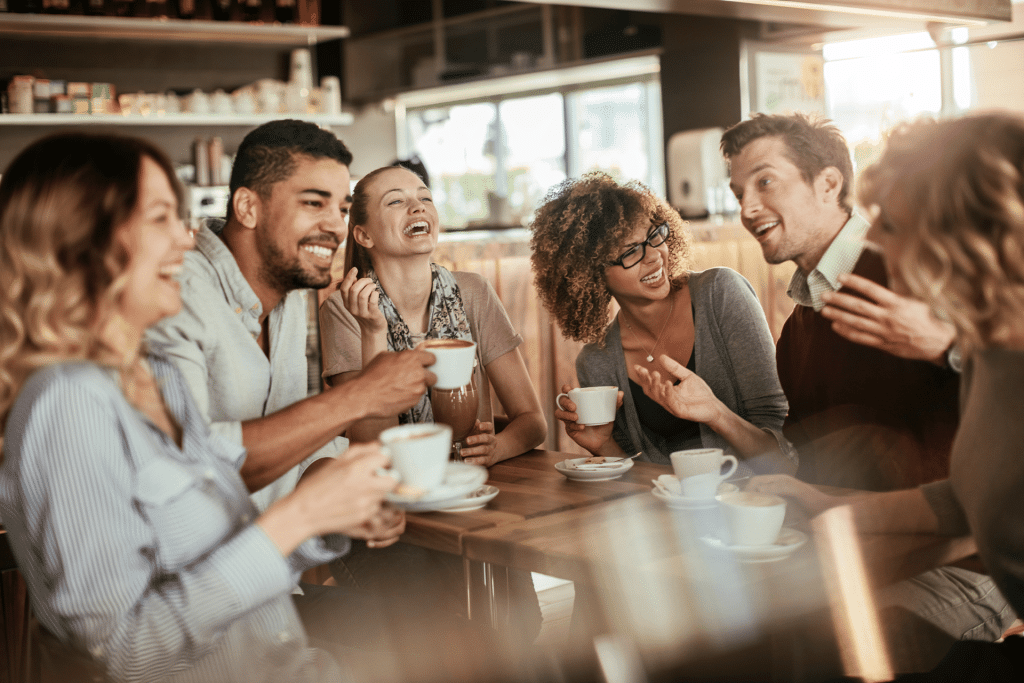 A group of friends laughing and eating at Bravo!