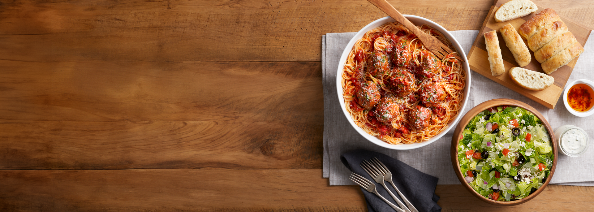 Bravo's spaghetti and meatballs with chopped salad and bread